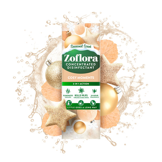 Zoflora concentrated disinfectant packet with Christmas ornaments on a white background
