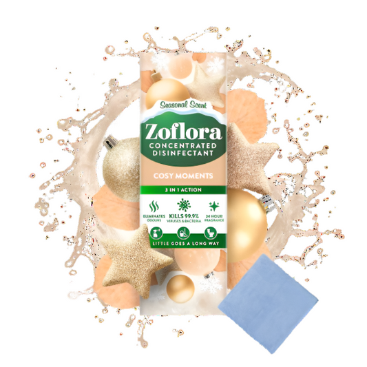 Zoflora concentrated disinfectant packet with decorative ornaments and a cleaning cloth on a white background